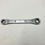 Mac Tools Ratcheting Pt. Box Wrench 3/8"-7/16" #RW1214. Fixed Price $13.95.