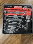 Sears Craftsman 7PC Metric Reversible Ratcheting Wrench Set 42407 8-18MM. Fixed Price $185.00.