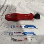 Snap-on Tools New Red Hard Handle Quick Cutter Saw W/ Bi-metal Blade HS50. Fixed Price $65.00.