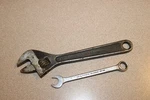 Vtg Proto Tools J708S, Black Adjustable Wrench, 1-1/8" Capacity 1214 7/16". Fixed Price $23.95.